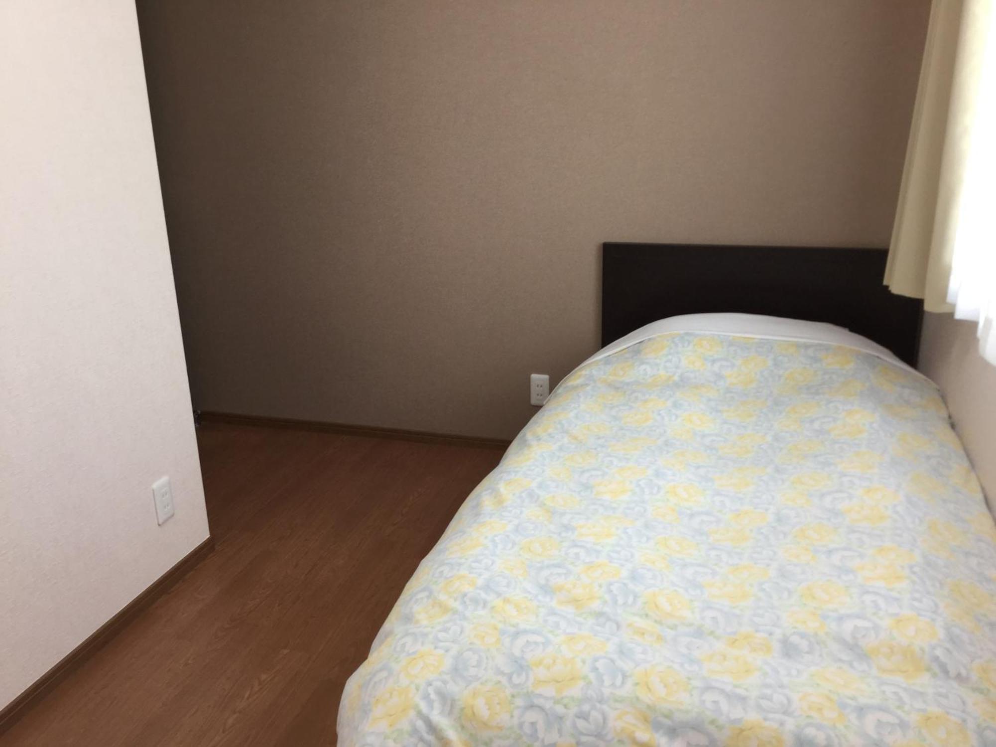 Business Inn Grandeur Fučú Pokoj fotografie